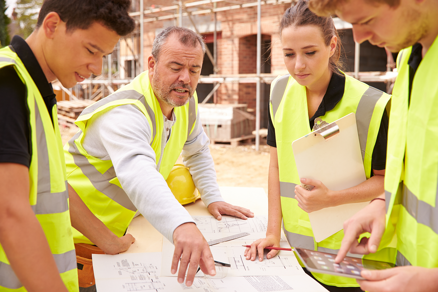 technicians reviewing schematics and blueprints - cooling tower experts