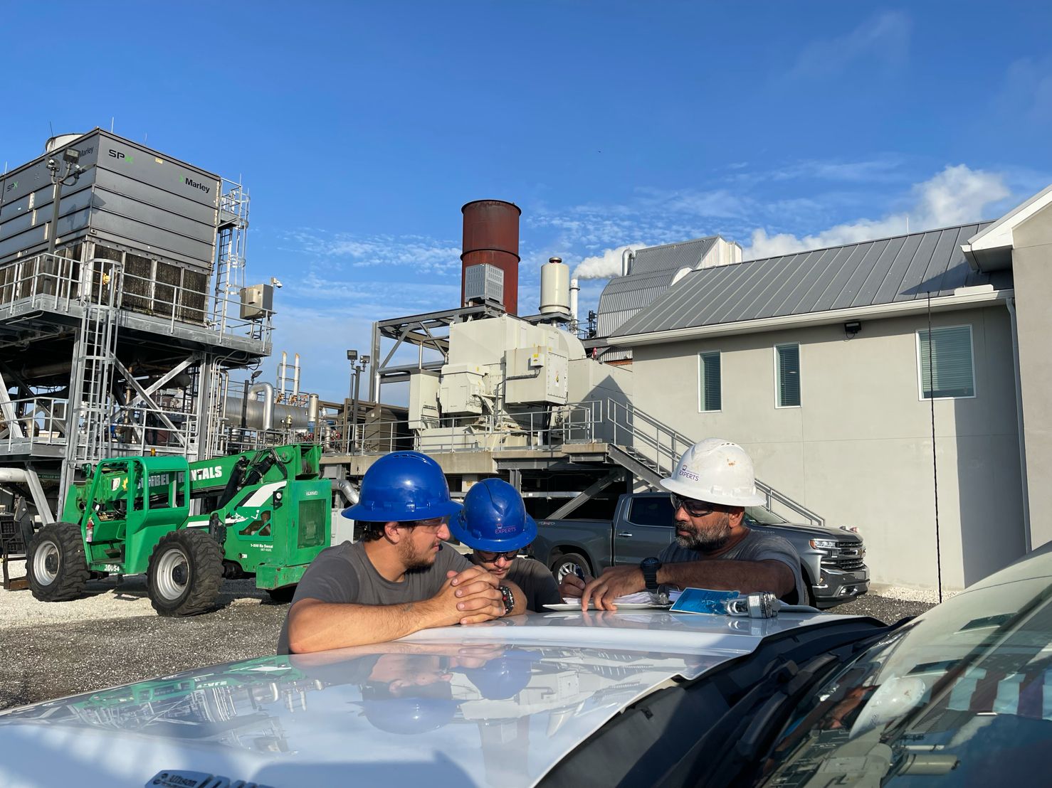 cooling tower experts technicians in a safety briefing