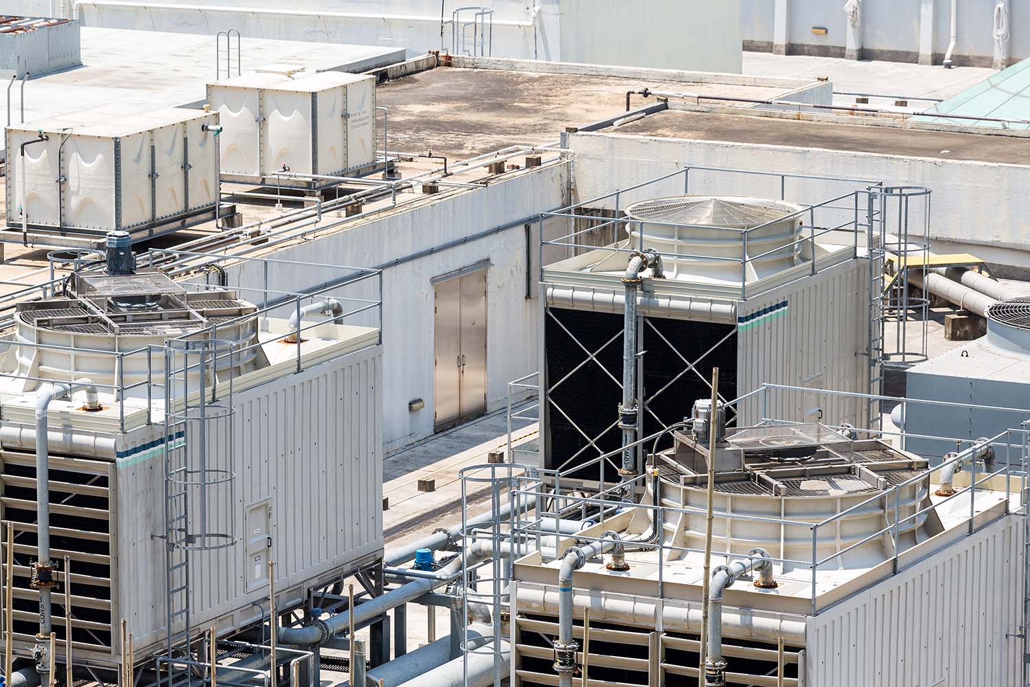 Cooling Tower Experts vview of cooling towers on a rooftop preparing for cooling tower inspections